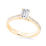 1 carat emerald lab diamond ring with shoulder diamonds yellow gold