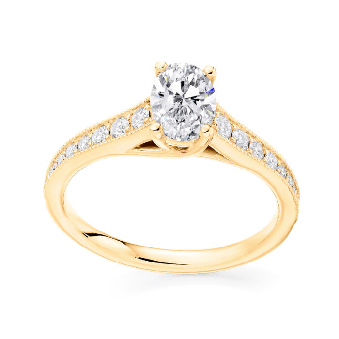 2 carat oval lab diamond ring with shoulder diamonds yellow gold