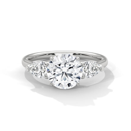 Pear and round lab diamond trilogy ring